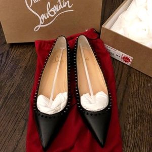 Never-worn Louboutin Spike Flats